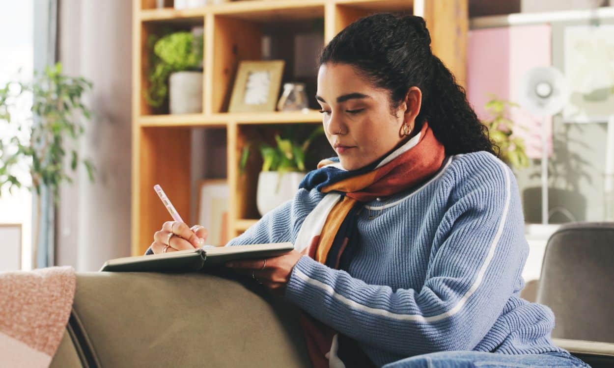 mindfulness and grief allowing transformation woman writing in journal